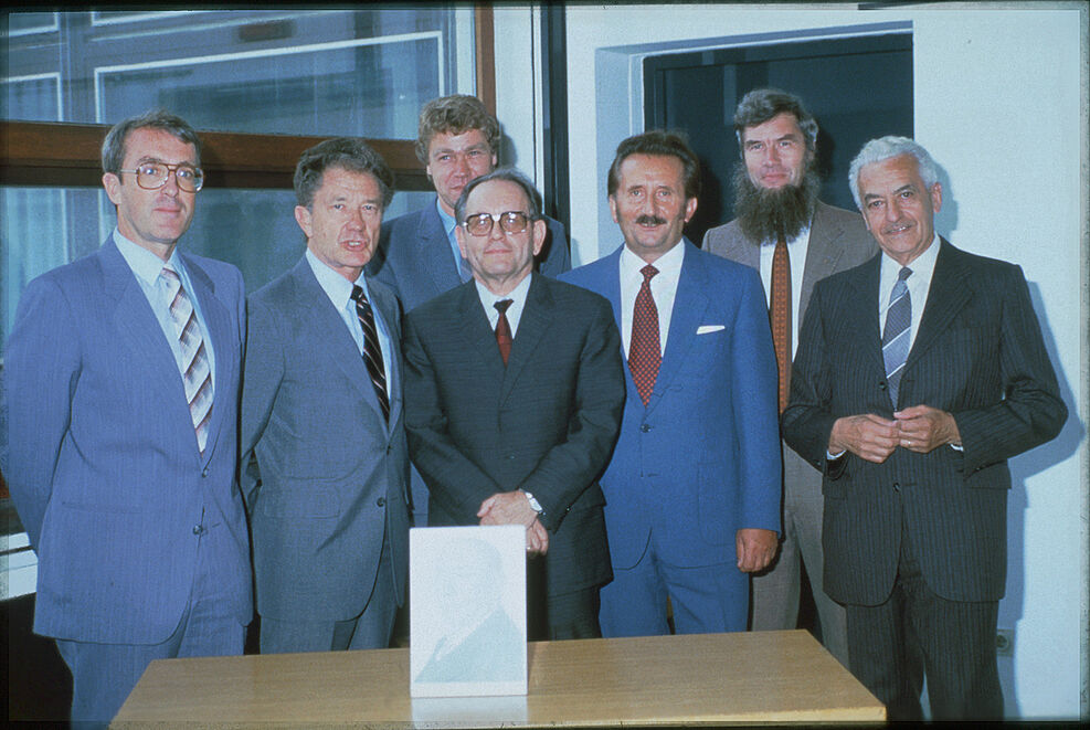 
	100 Jahre Ernst Berliner, Festveranstaltung 1980, von re: Weiser (Prag), Langenbruch, Huger, Krieg, Norbert Becker, Briggs (USA), unbekannt
