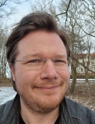 Dr. Christopher  Arlt